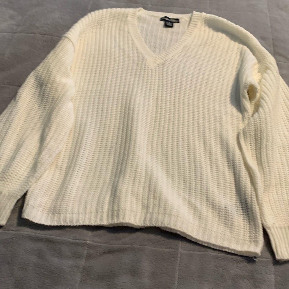 Cream colored, balloon sleeve sweater.